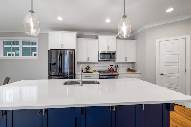 kitchen with white and navy counters